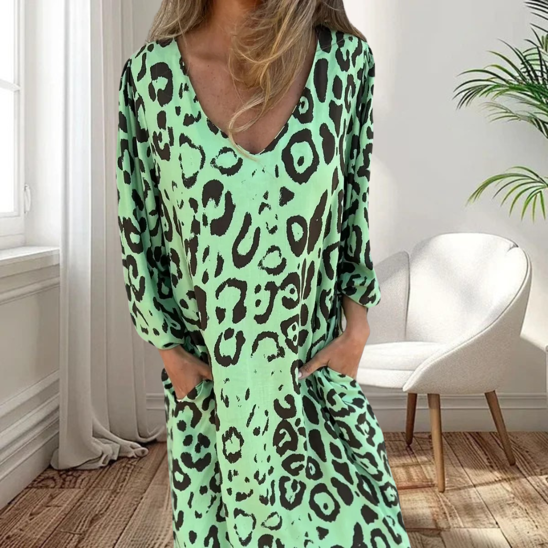 Snygg lång V-ringad leopard klänning
