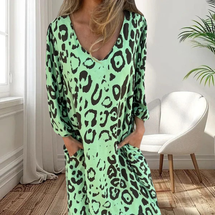 Snygg lång V-ringad leopard klänning