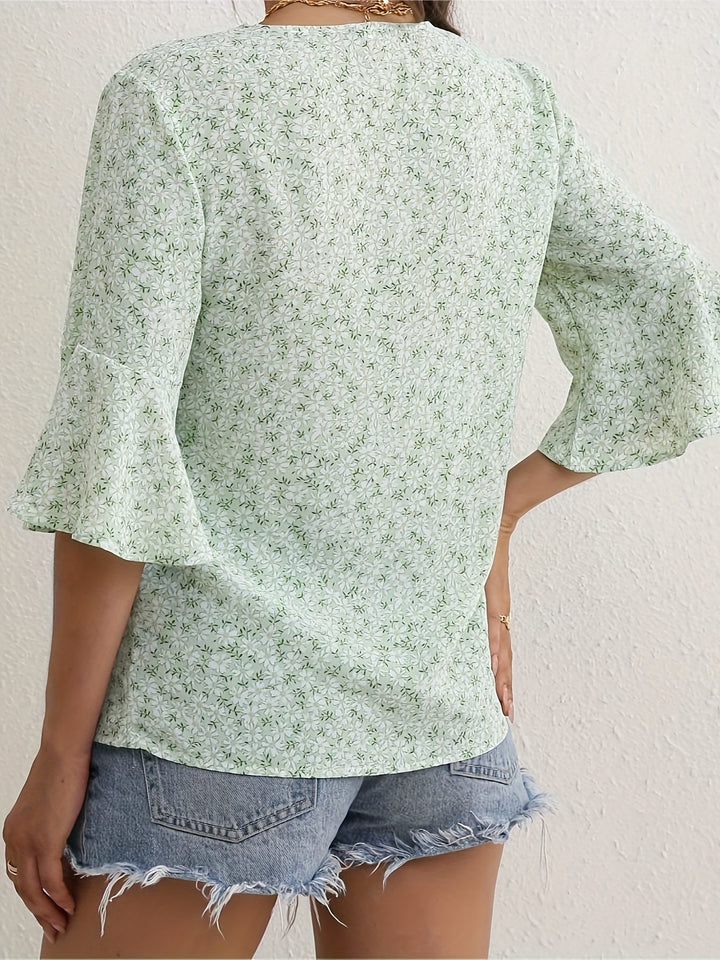 Blommig volang-ärm blus