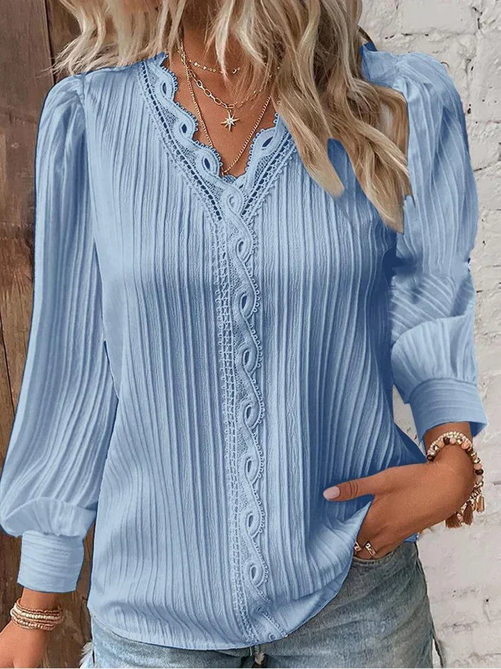 Elegant spets-kantad blus