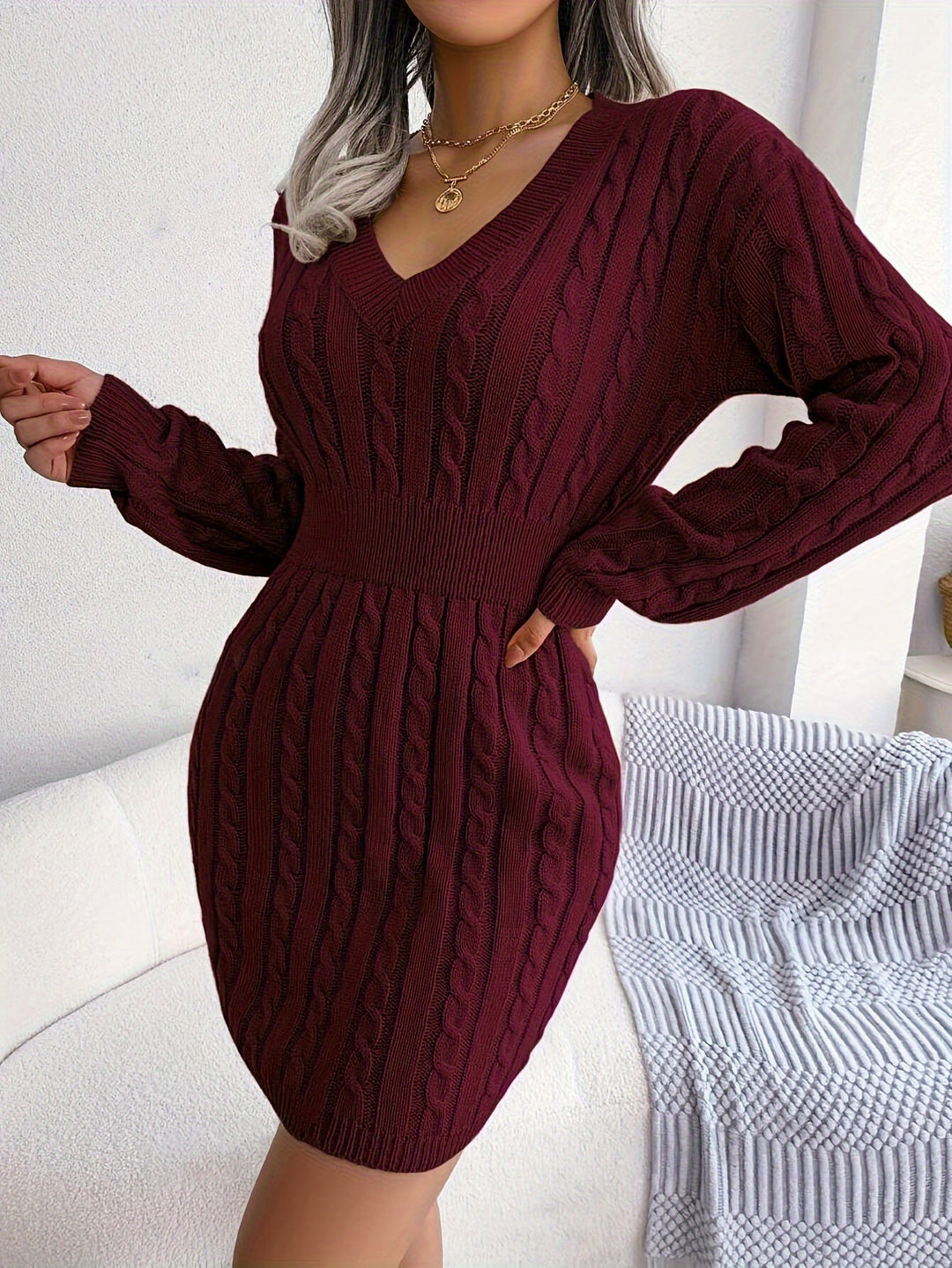 Kabelstickad peplum tröjklänning