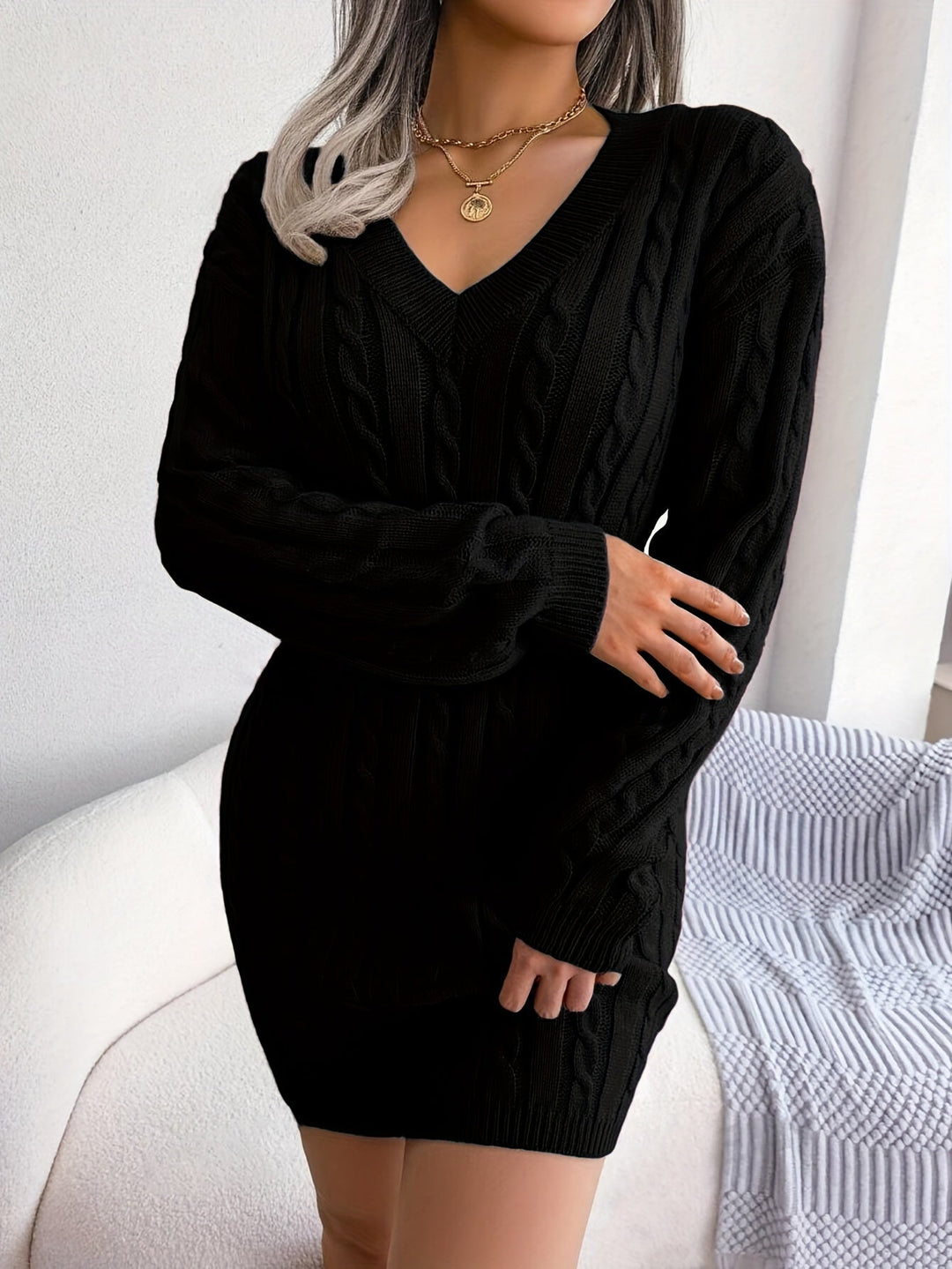 Kabelstickad peplum tröjklänning