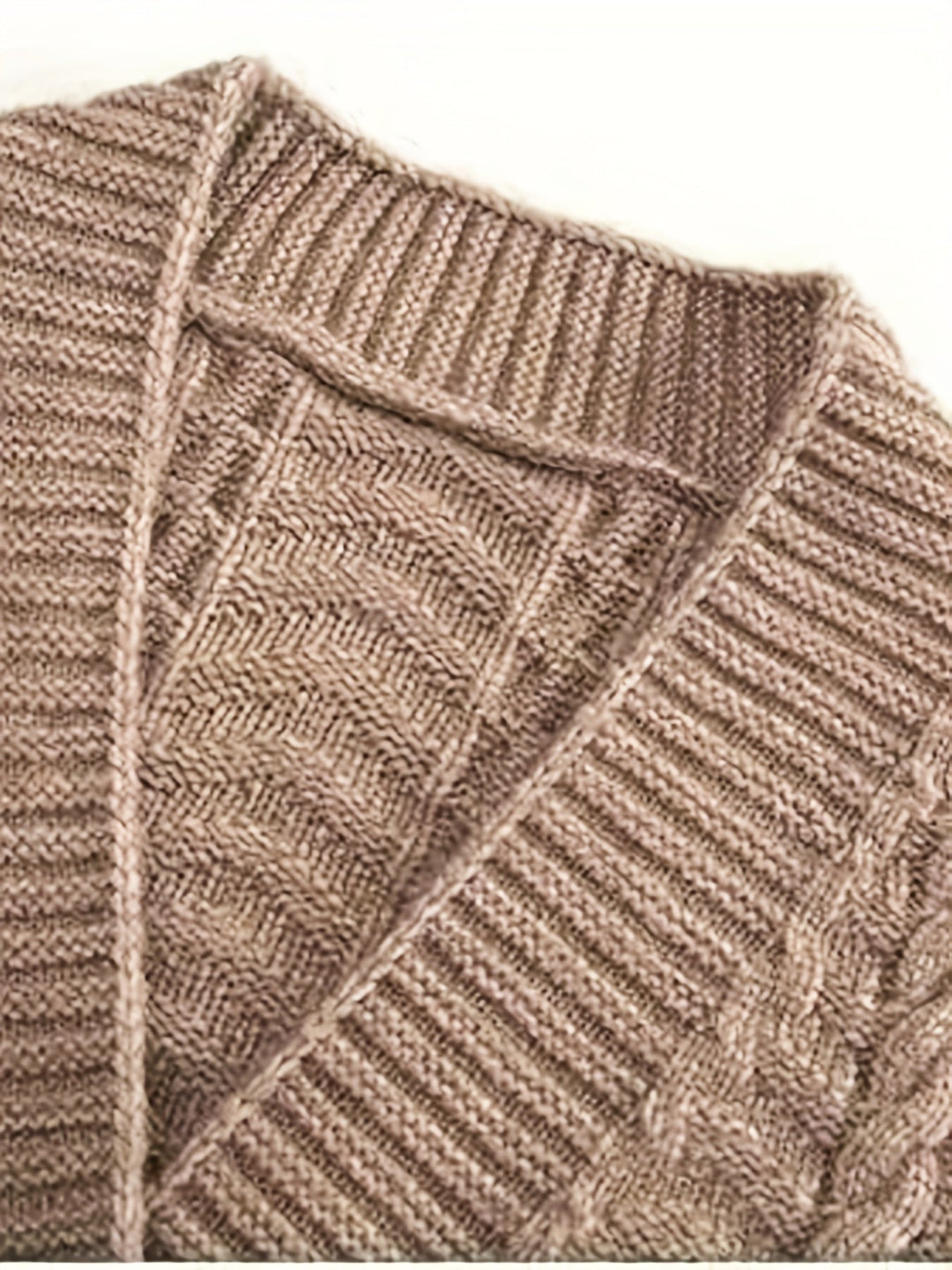 Kabelstickad longline kofta