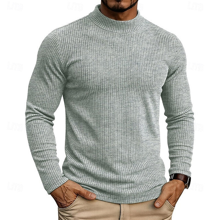 Ribbstickad mockneck topp