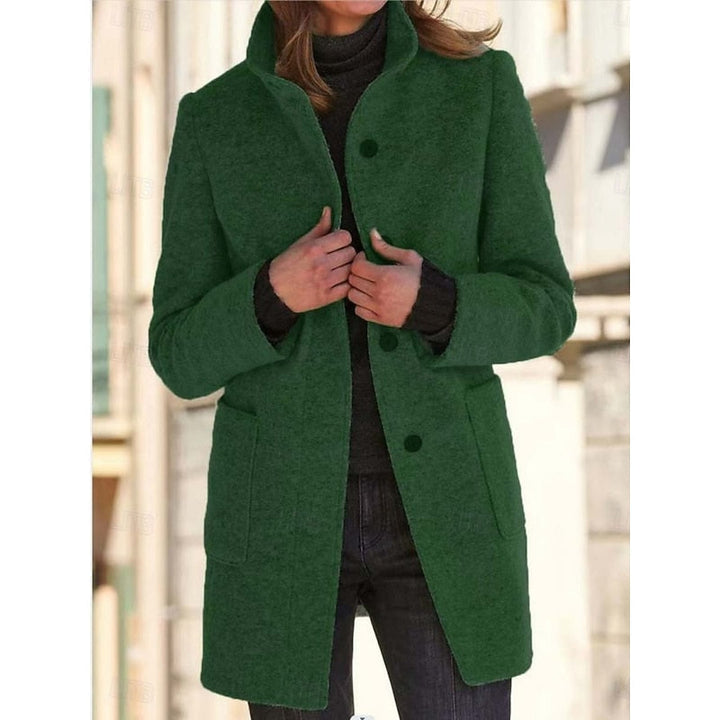 Förfinad med ståkrage kappa