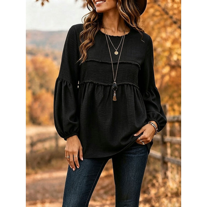 Avslappnad peplum blus