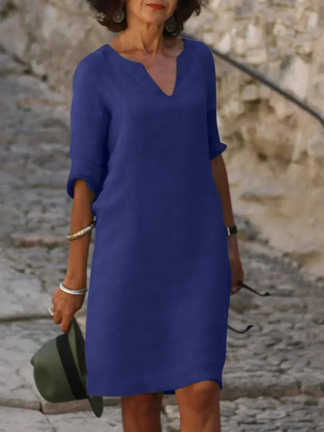 Elegant V-ringad draped midi klänning